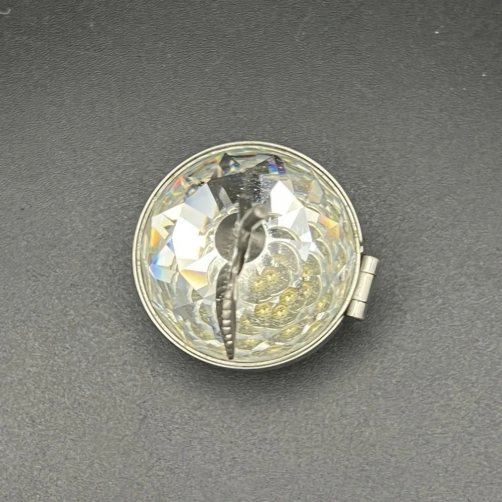 Swarovski returns post